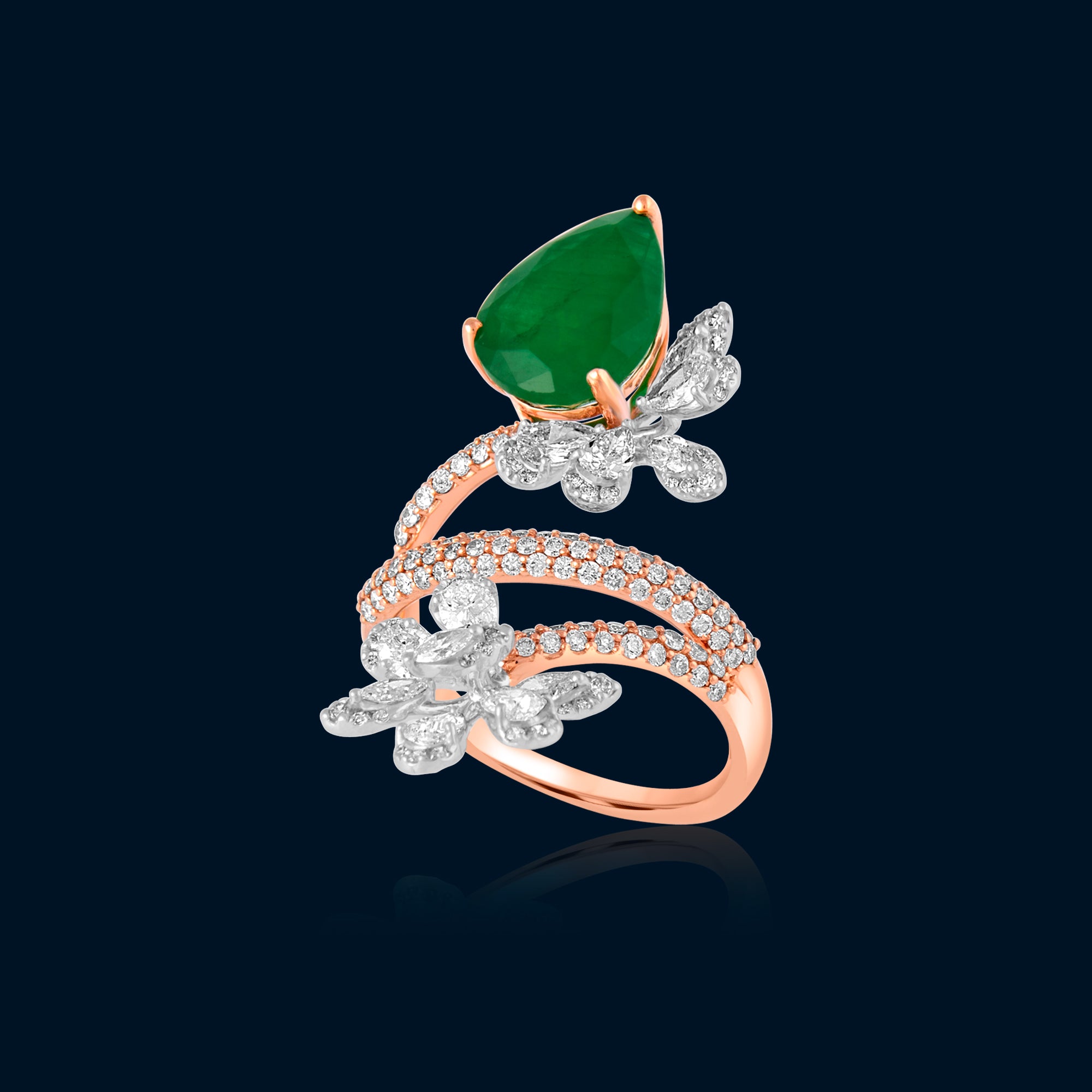 Ring In 18Kt Rose Gold With Round Brilliant, Marquise & Pear Cut Diamonds Studded With Precious Emerald