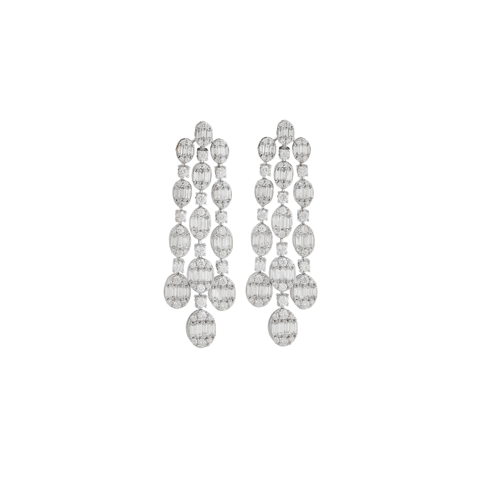 Necklace set in 14kt white gold with brilliant round diamonds and baguettes.