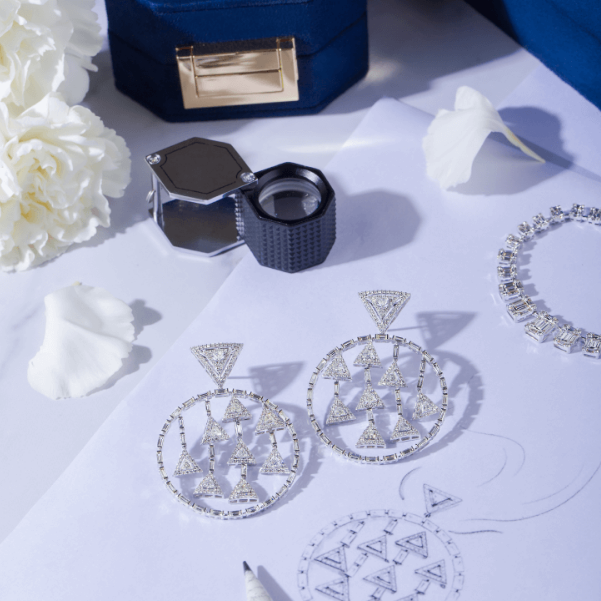 Earrings in 14kt white gold with Round Brilliant, Baguettes & Trillion cut diamonds