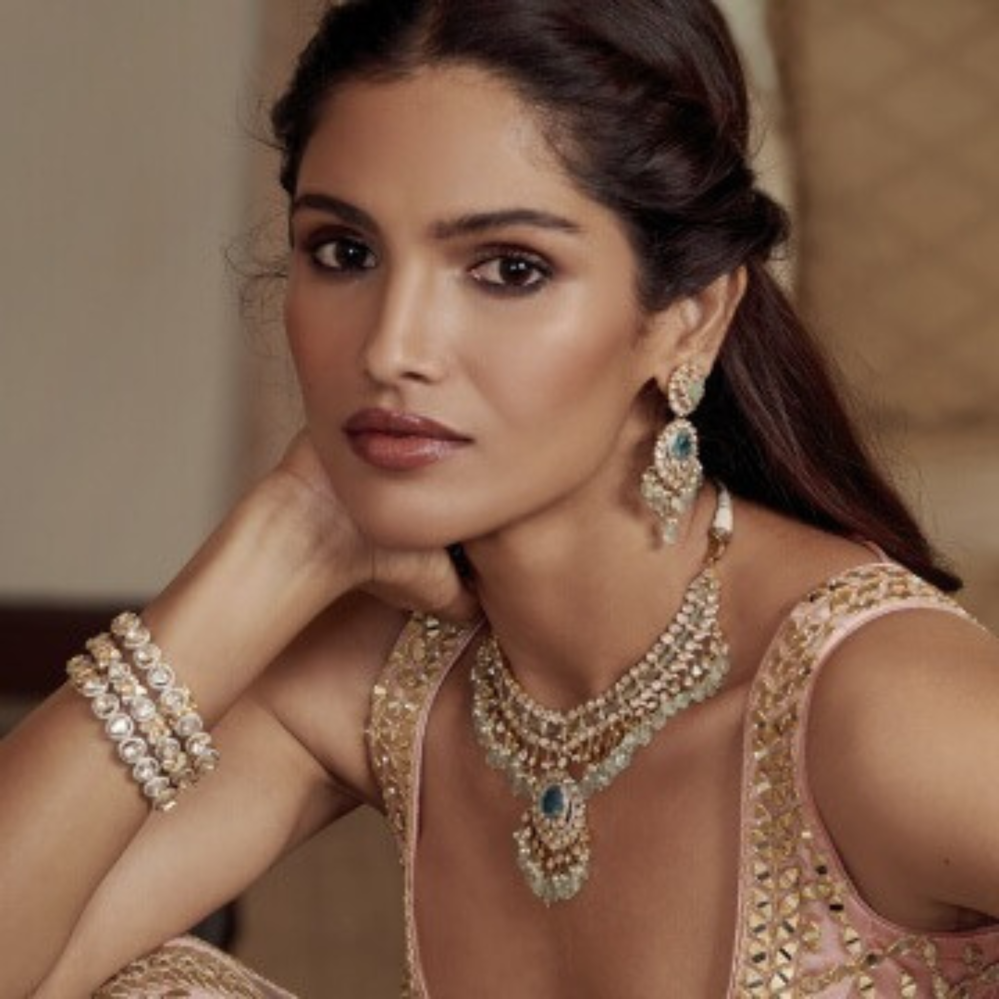 Polki diamond necklace set in 18kt gold with semi-precious green gemstones