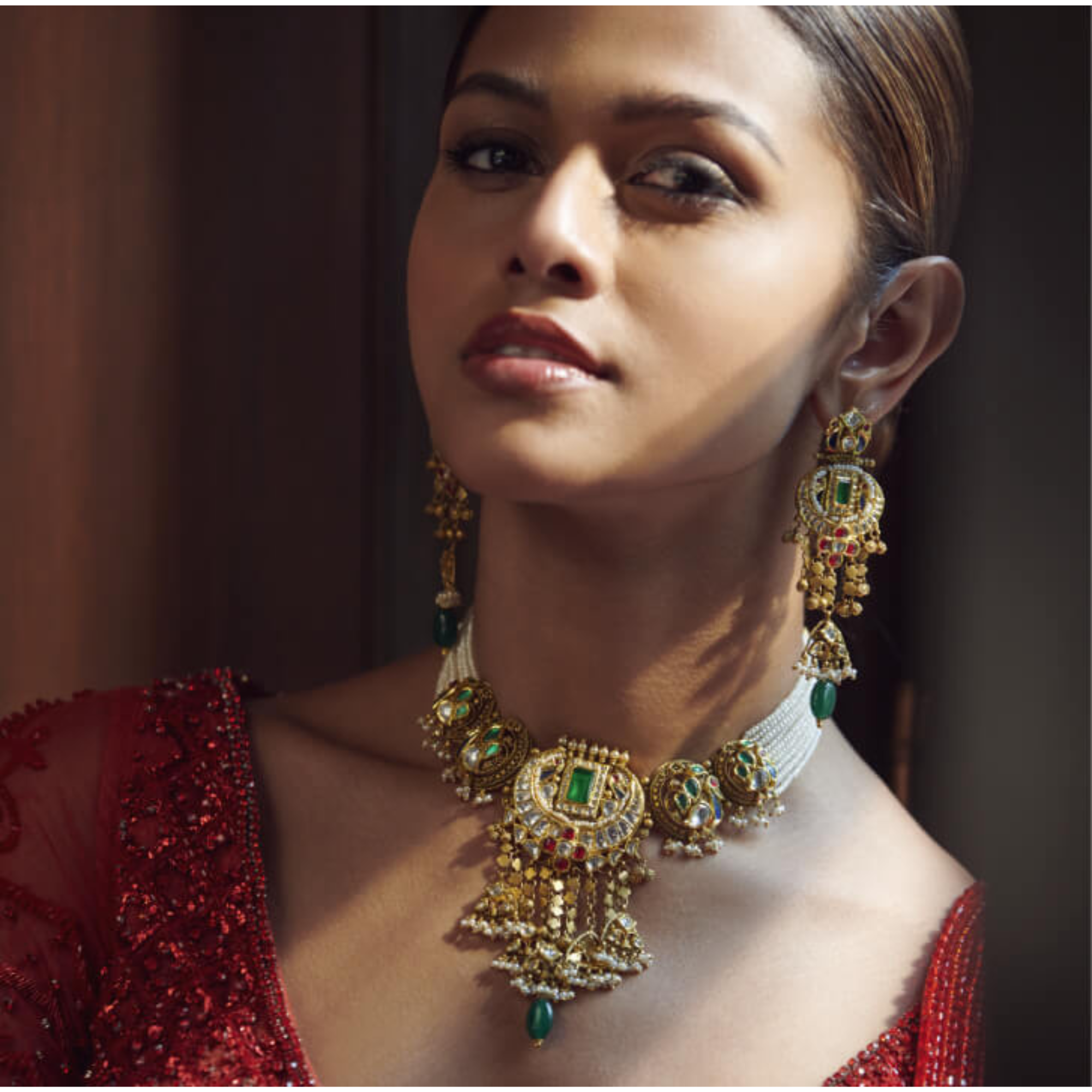 Necklace set in 22kt antique gold with red & green semi-precious gemstones & pearls