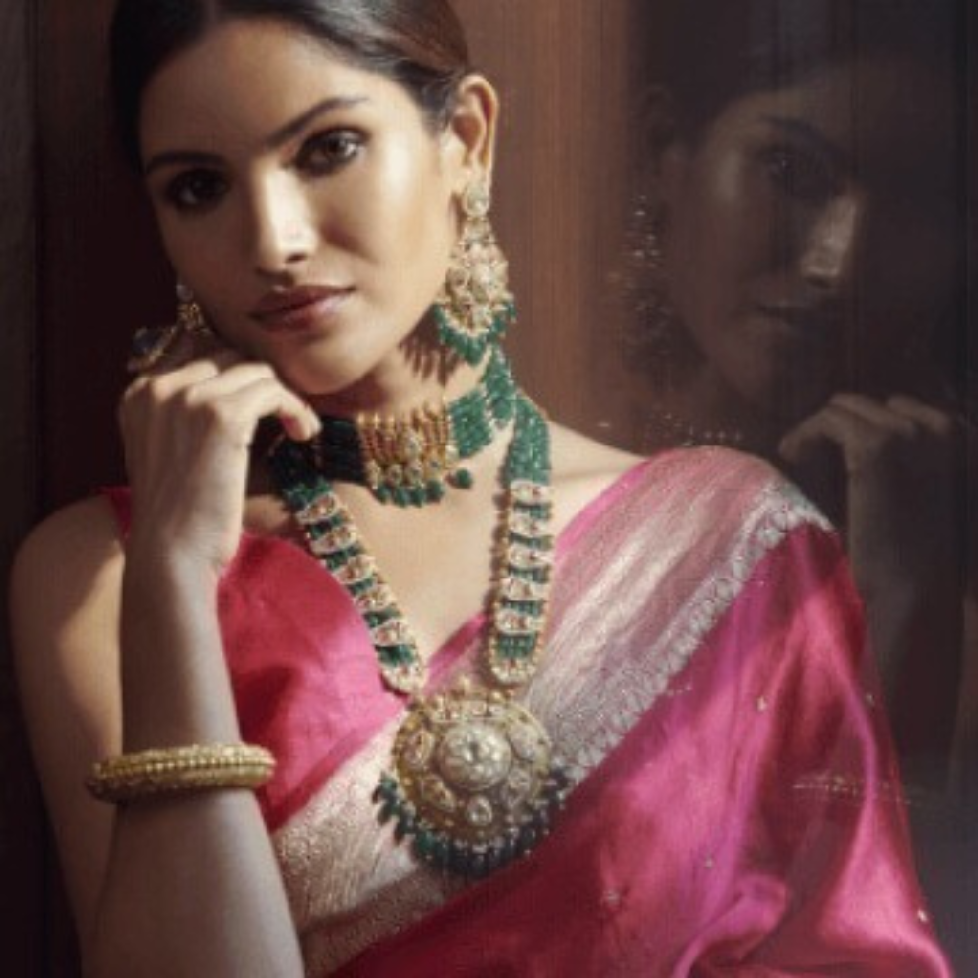 Necklace in 22kt gold with semi-precious green & red gemstones,mother of pearl & pearls