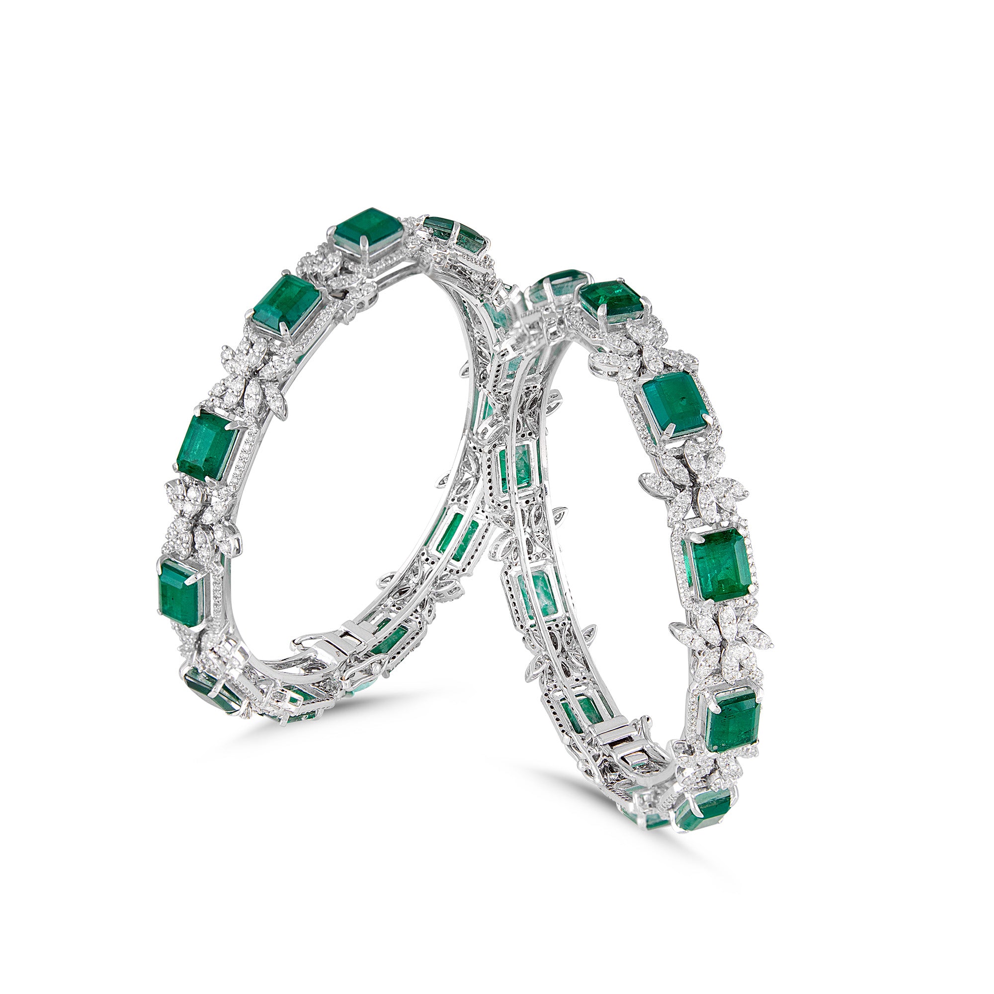 Bangles in 14kt white gold with Round brilliant cut diamonds studded with semi-precious green gemstones