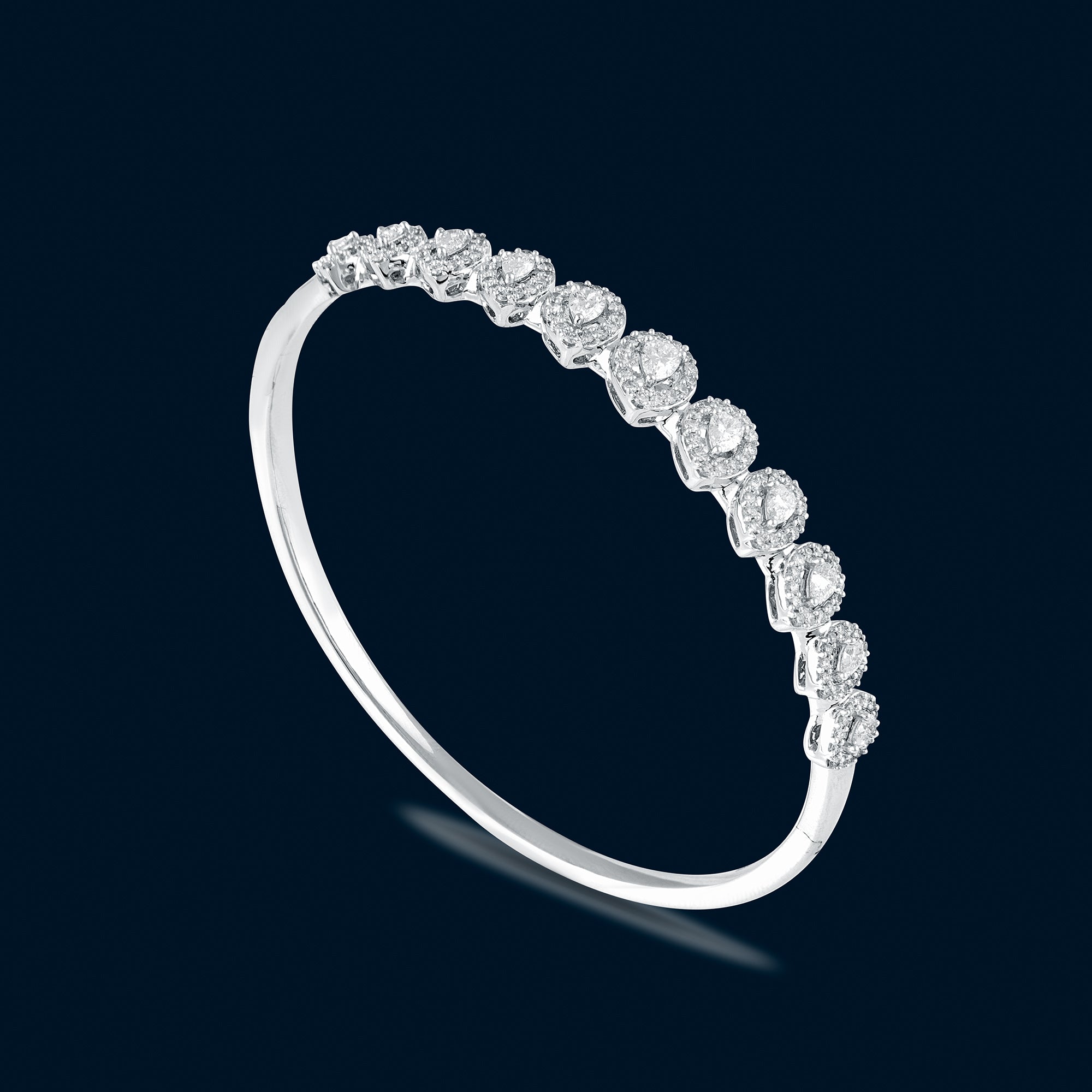 Bracelet in 14kt white gold with Pear & Round Brilliant cut diamonds