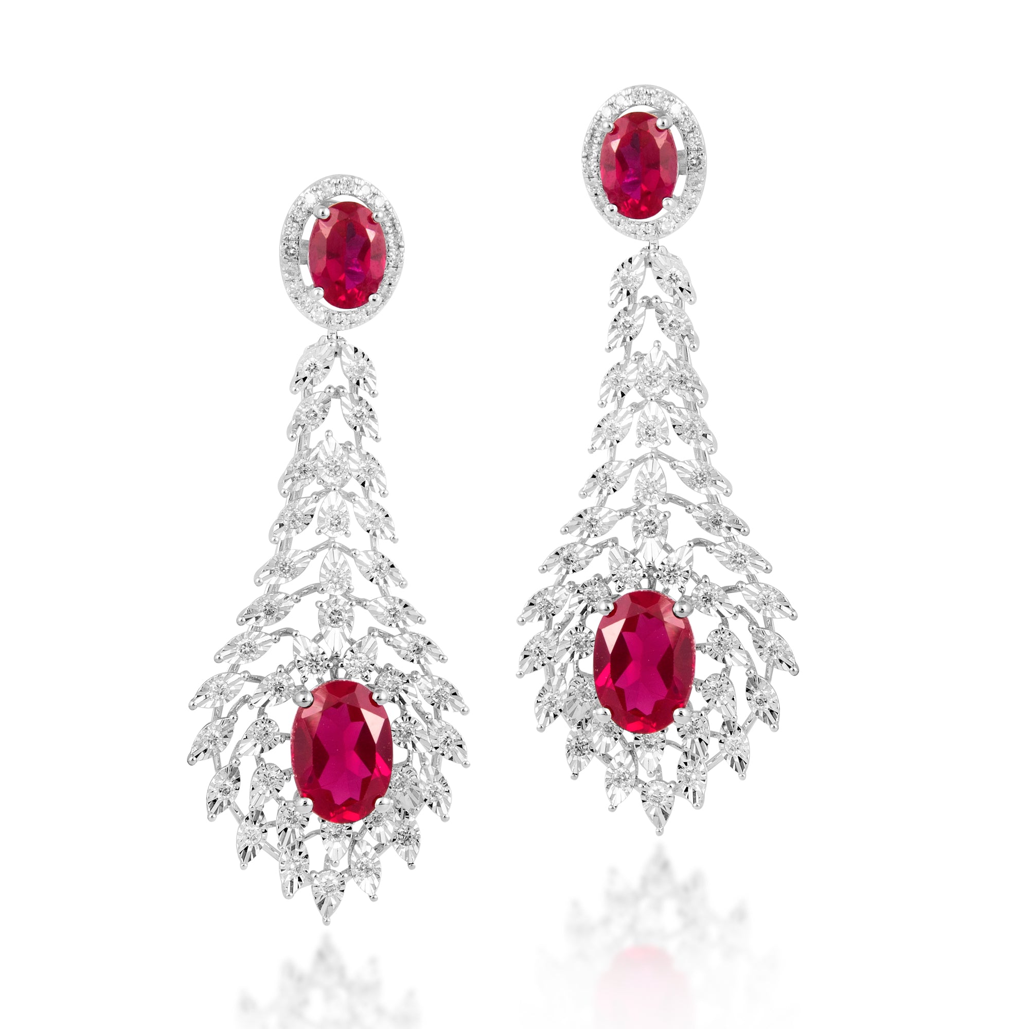 Earrings in 14kt white gold with  Round Brilliant cut diamonds & semi-precious green gemstones