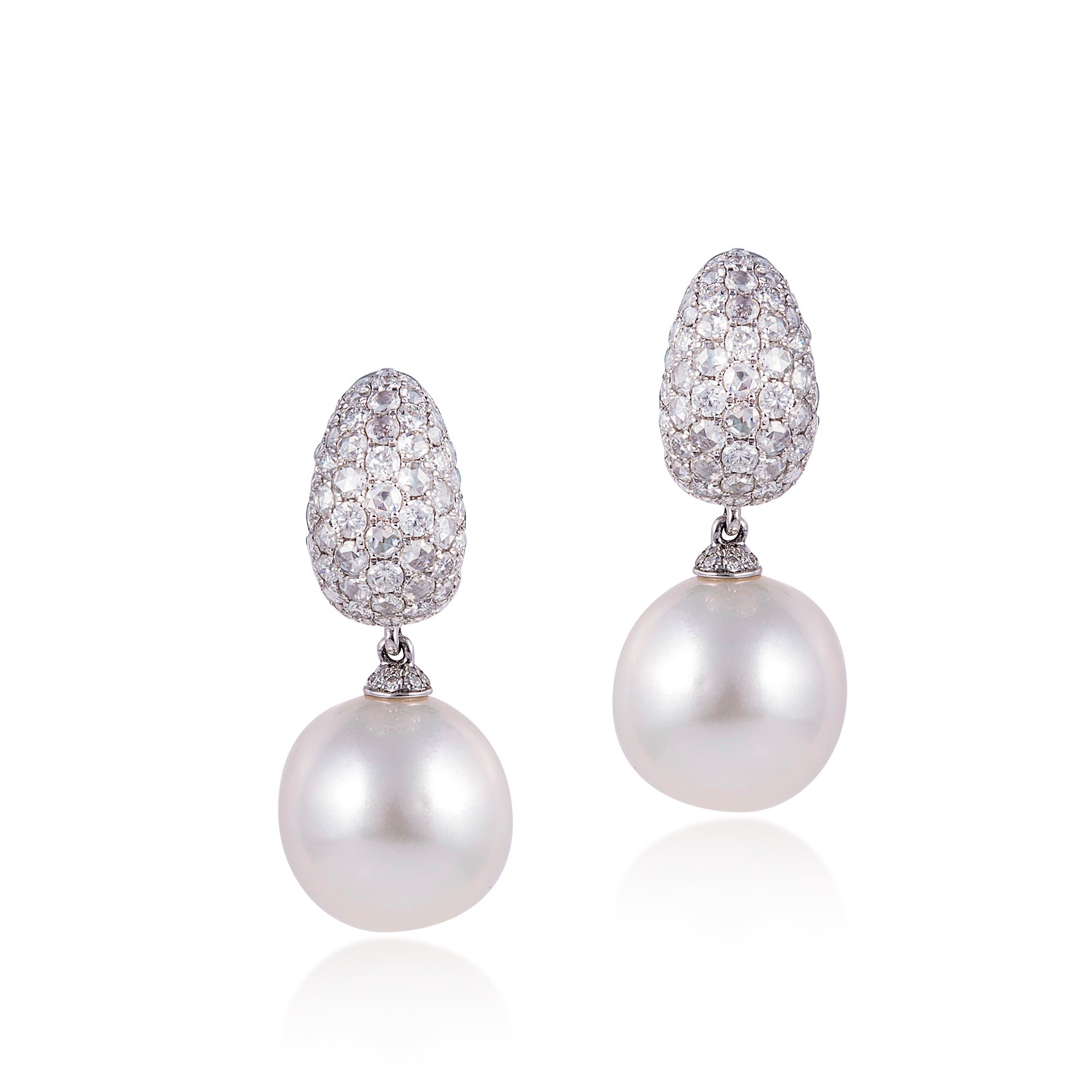 Earrings in 18kt White gold with Round Brilliant cut diamonds & Pearls.