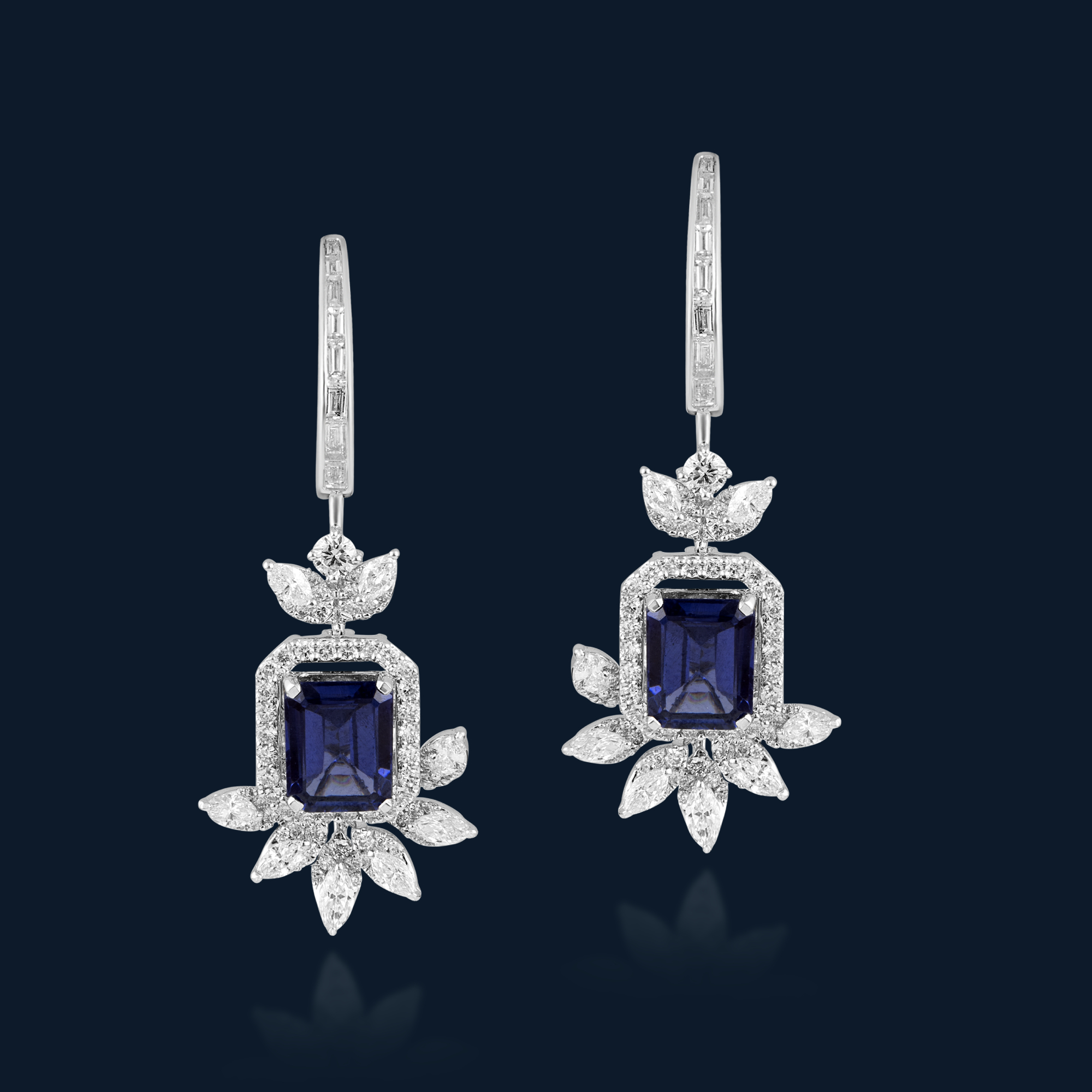 Earrings in 18kt white gold with Marquise, Bagguetts & Round Brilliant cut diamonds studded with semi-precious blue gemstone