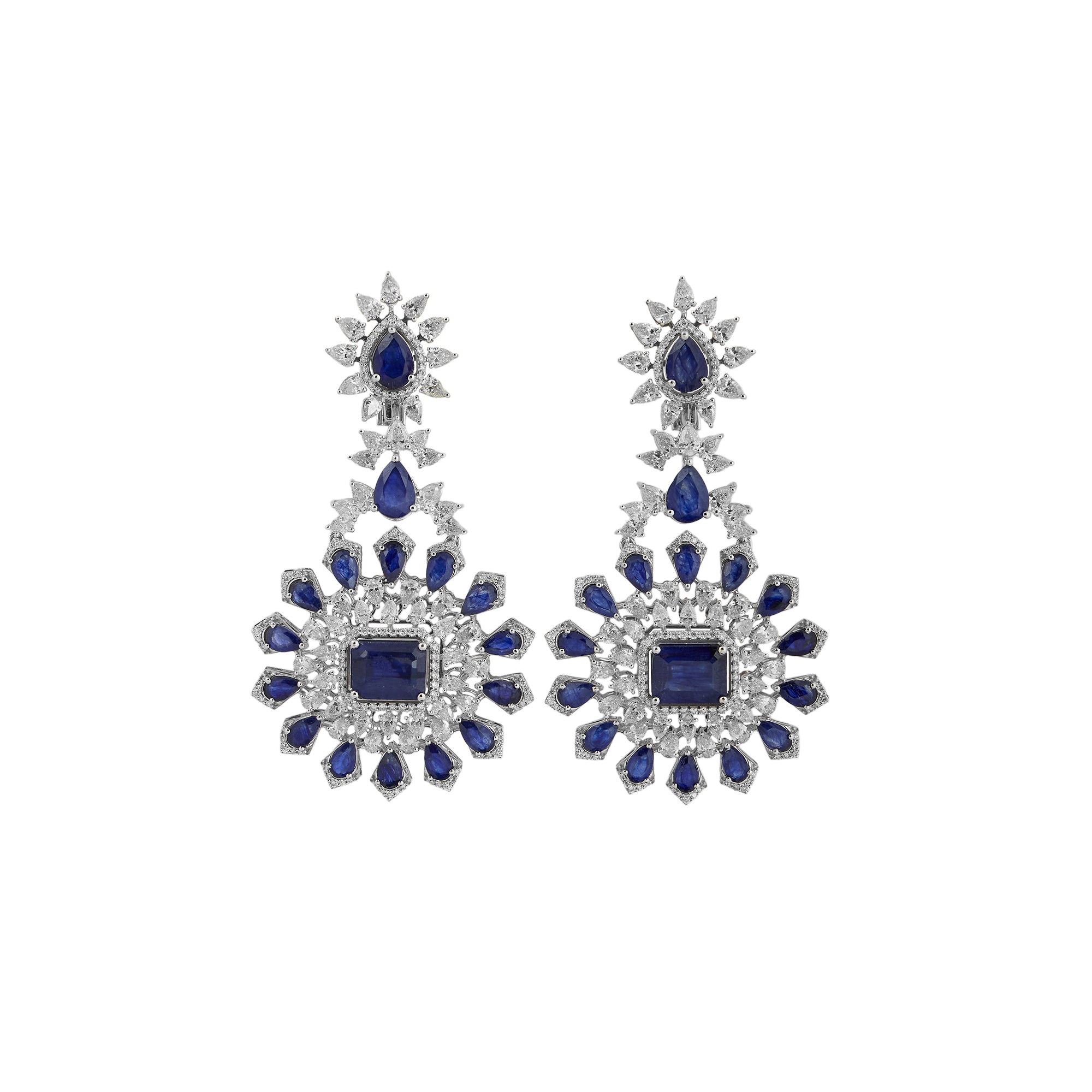 Necklace set in 14kt white gold with brilliant round and pear shaped diamonds.