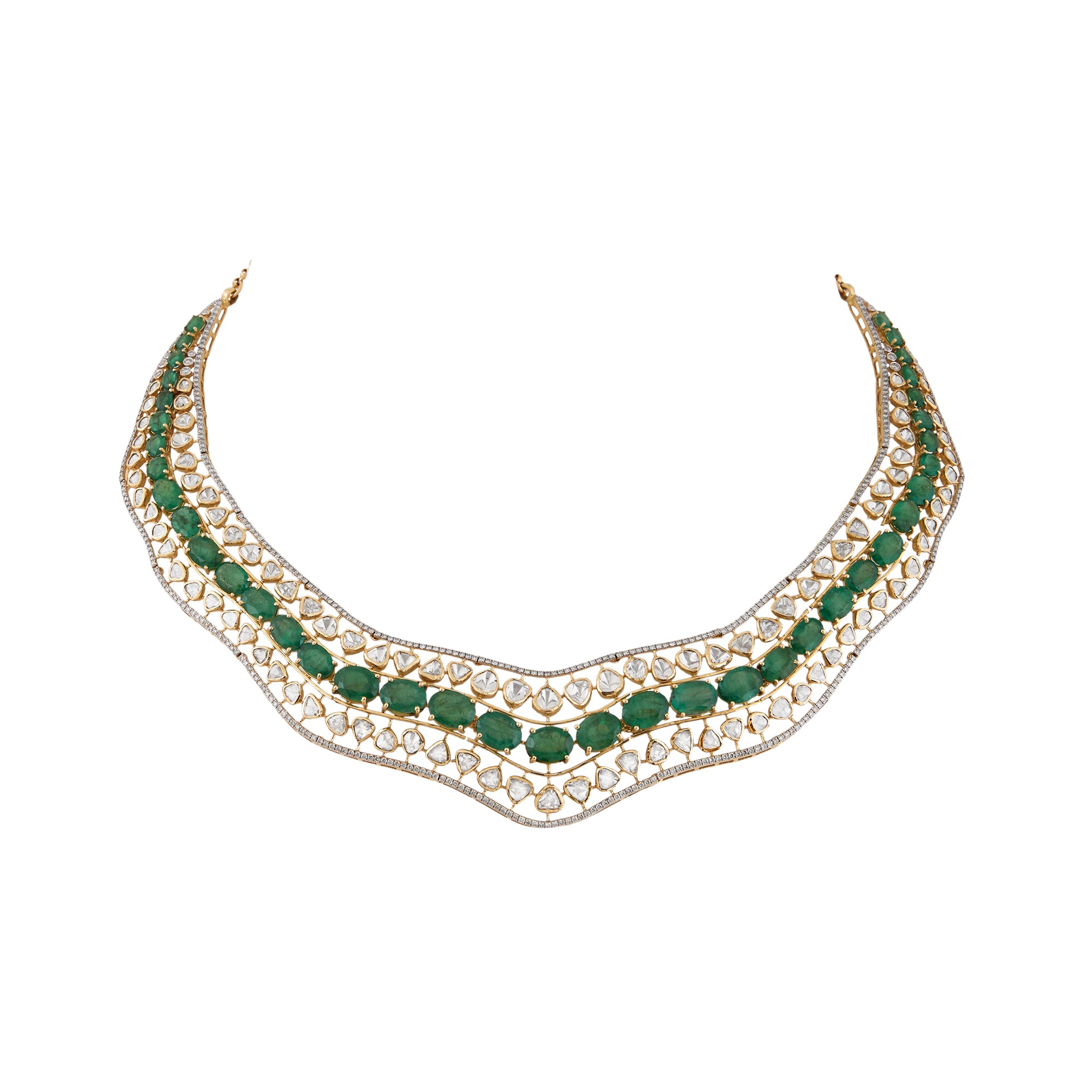 Necklace set in 14kt yellow gold with brilliant round and precious emerald.