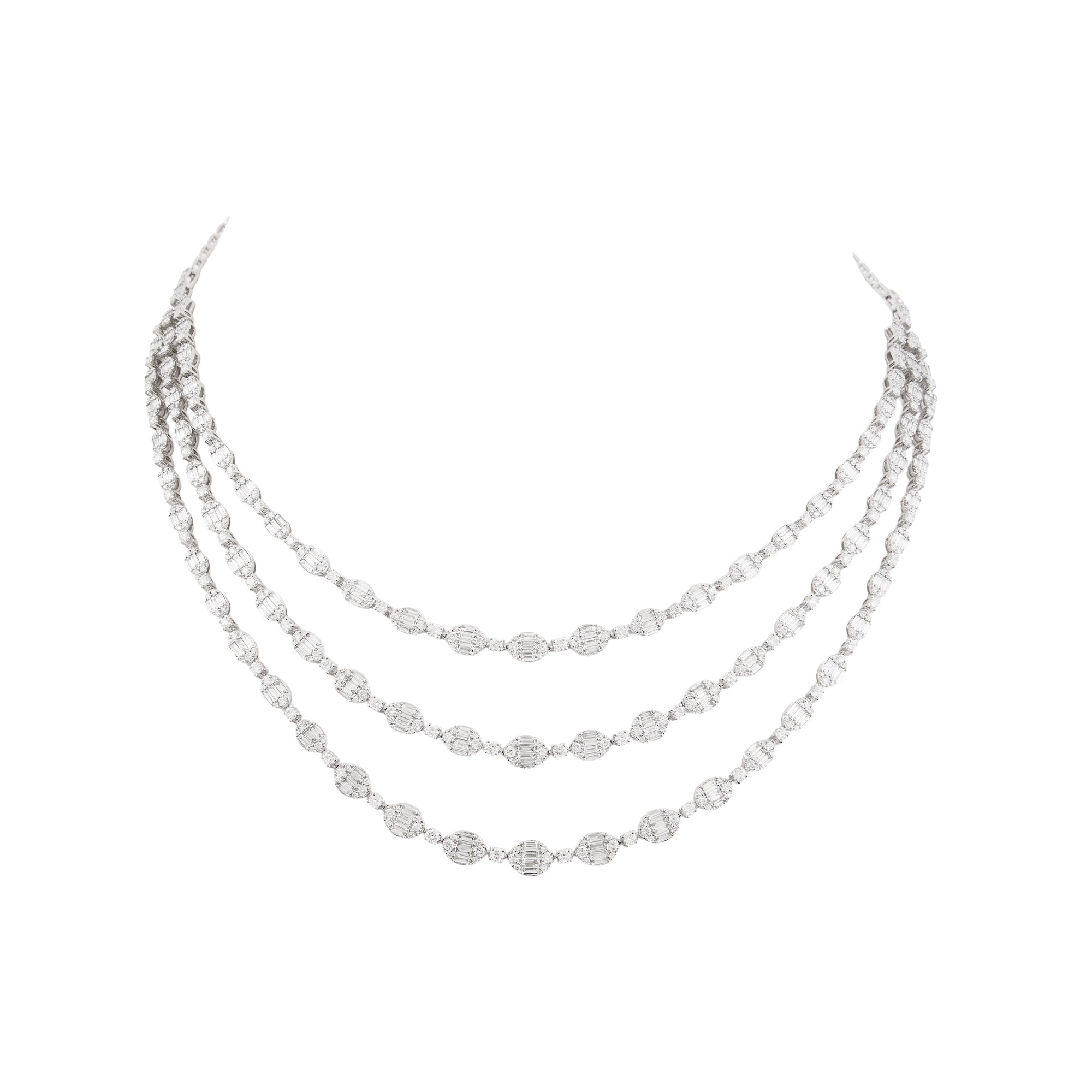 Necklace set in 14kt white gold with brilliant round diamonds and baguettes.