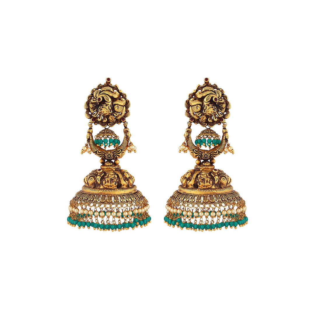 Earrings in 22kt temple Antique gold, with emerald and pearl.