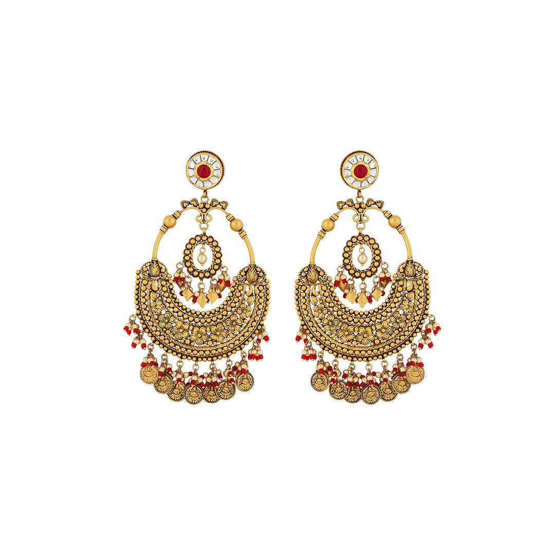 Earrings in 22kt antique gold with kundan touch ruby.