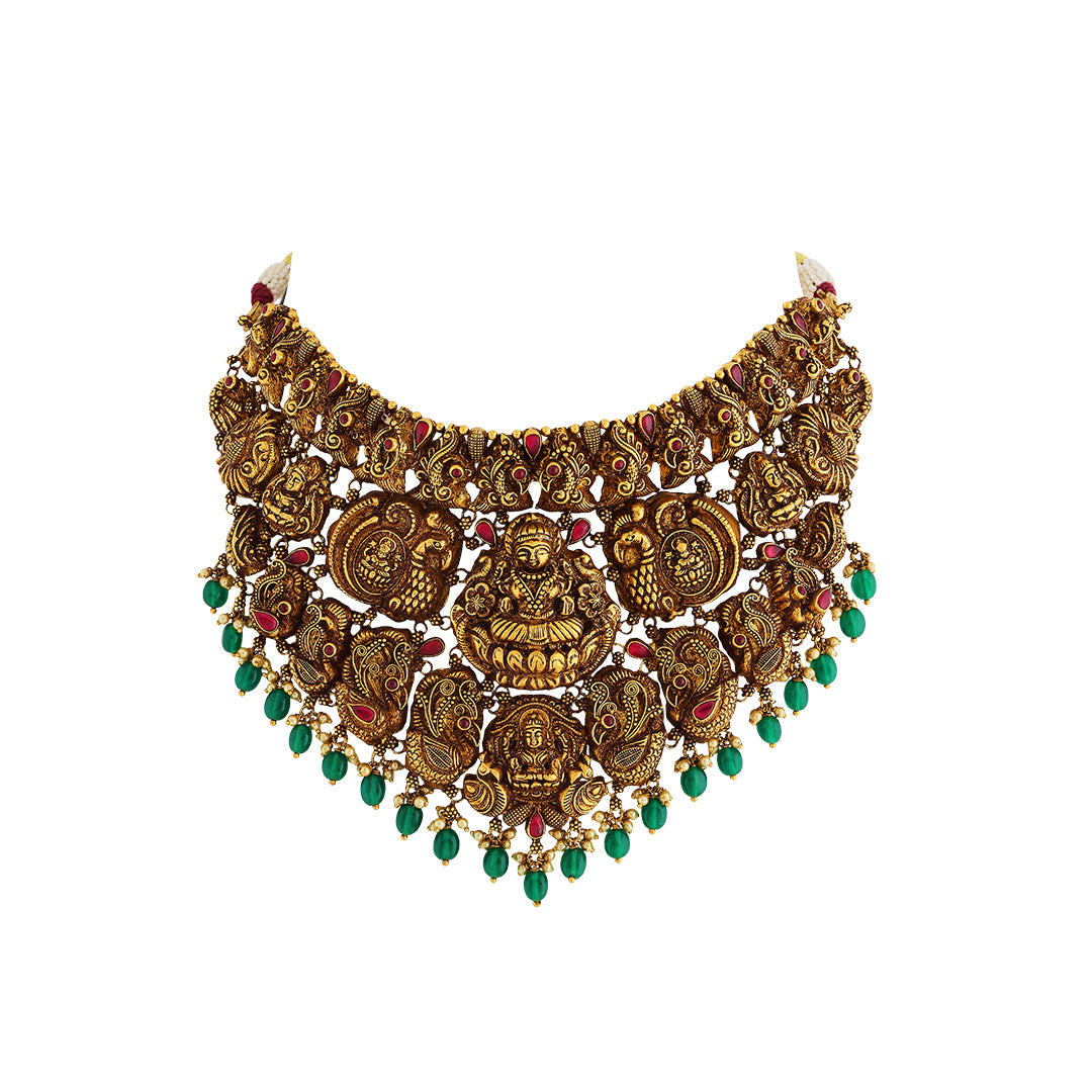 Necklace set in 22kt temple Antique gold, with emerald and pearl.