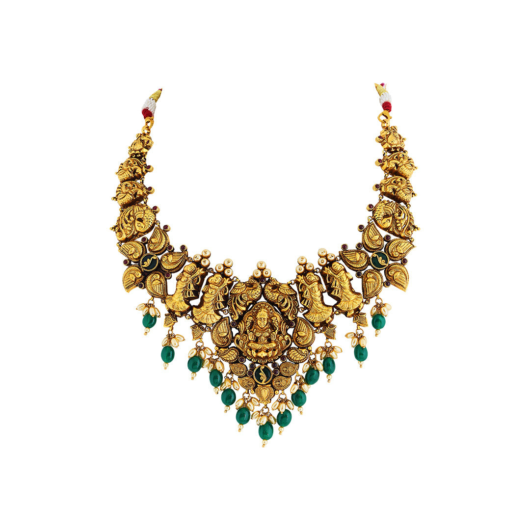 Necklace set in 22kt temple Antique gold, with emerald and pearl.