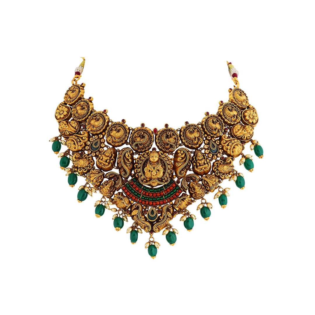 Necklace set in 22kt temple Antique gold, with emerald and pearl.