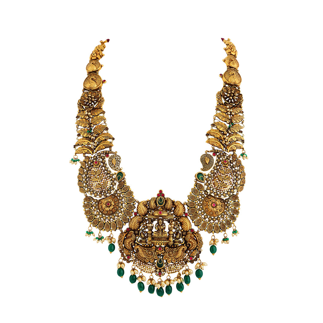 Necklace set in 22kt temple Antique gold, with emerald and pearl.