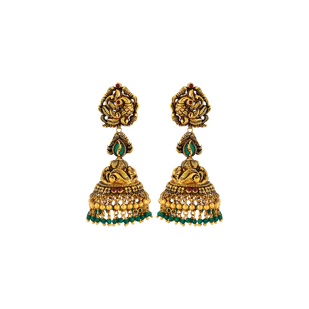 Earrings in 22kt temple antique gold with emerald and pearl.